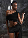 The Hollow Bandage Tassel Mini — Locryn